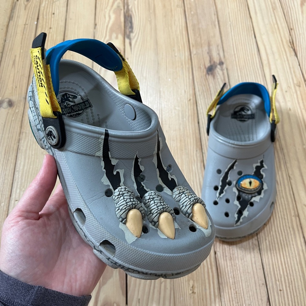 Crocs Jurassic World All-Terrain Clog Kids Size J3 Grey Dinosaur Claws Eye